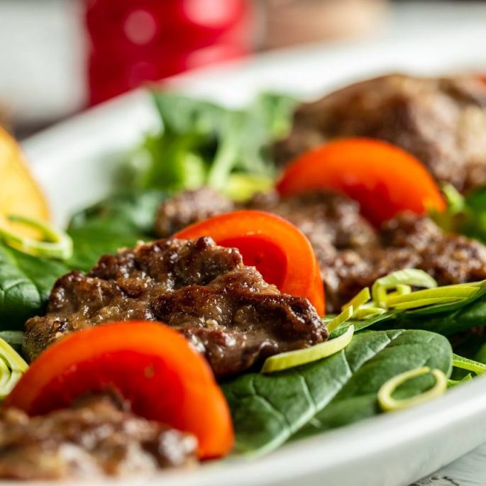 Warm salad with tender chicken liver
